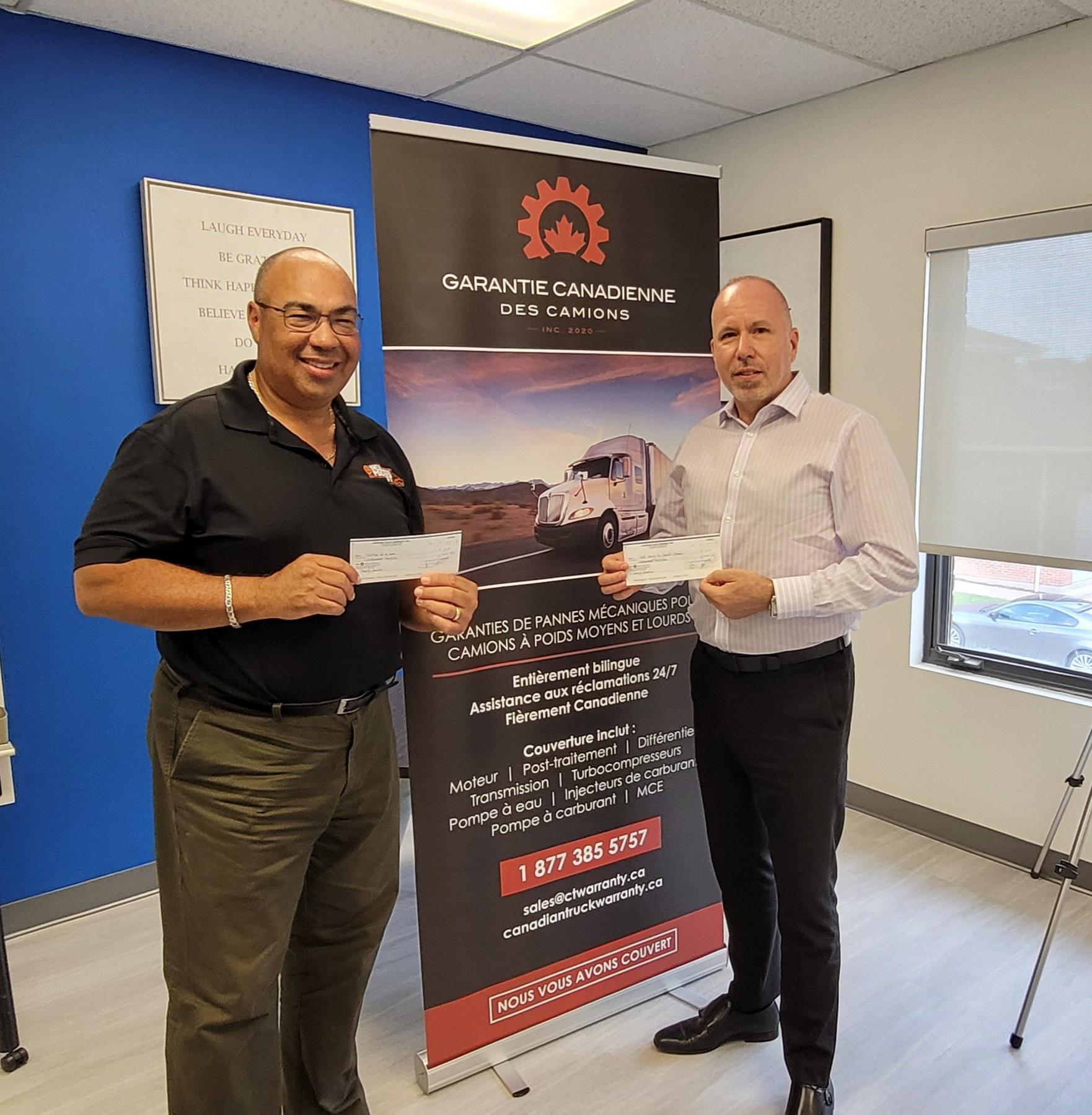 Paul and Bruce with cheque