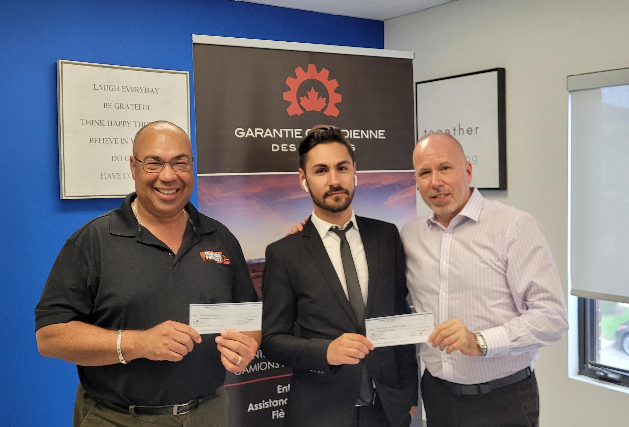 Paul and dario presenting cheque