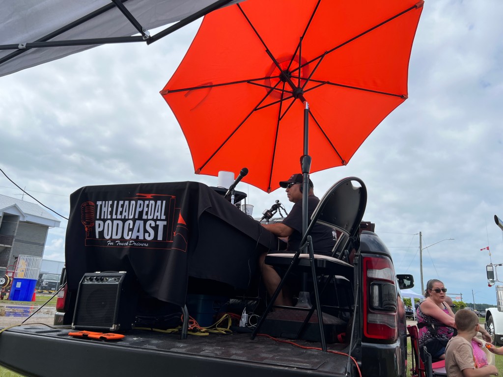 Bruce broadcasting on cruiser